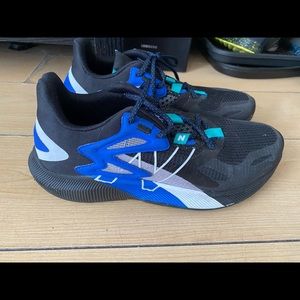 Black and blue New Balance. Men size 8.
